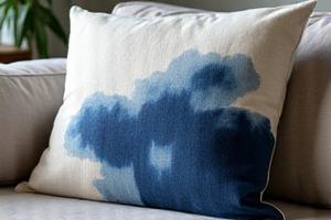 Textured linen pillow cover with a bold Kumo Shibori design in deep indigo