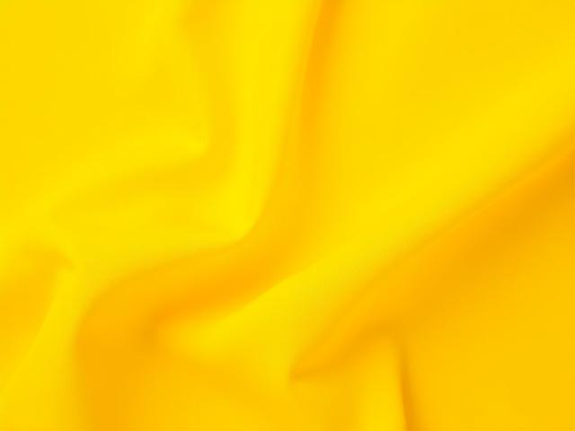 Vibrant marigold yellow organic cotton fabric